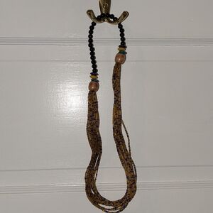 Blue and gold beaded necklace
